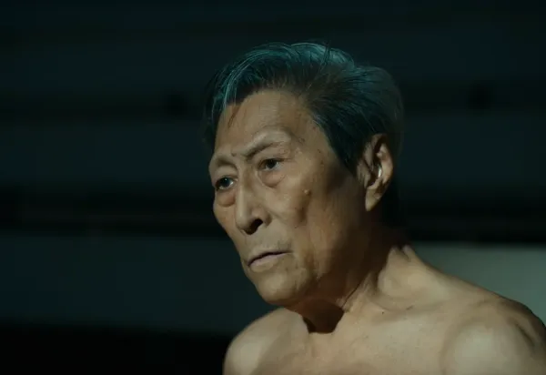 Man in Black by Wang Bing