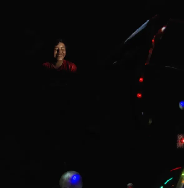 Motorcyclist's happiness wont fit into his suit