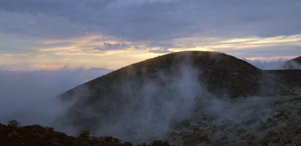 Standing Above the Clouds