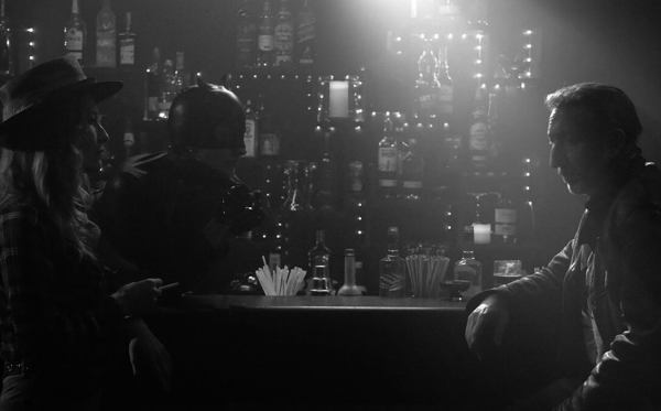 CLUB. INTERIOR. NIGHT
